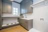 casa en Gray Line Builders. por Gray Line Builders.