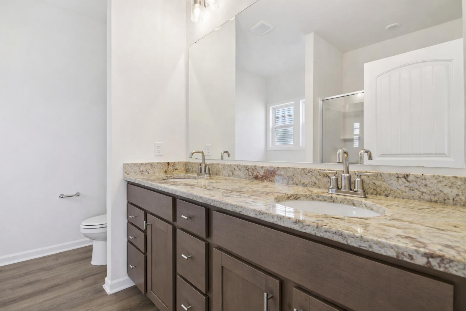 Modern dual vanity with granite countert