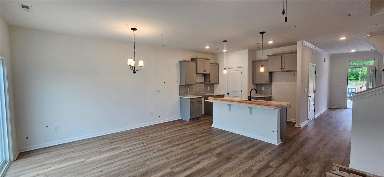 This open concept living space features a modern k