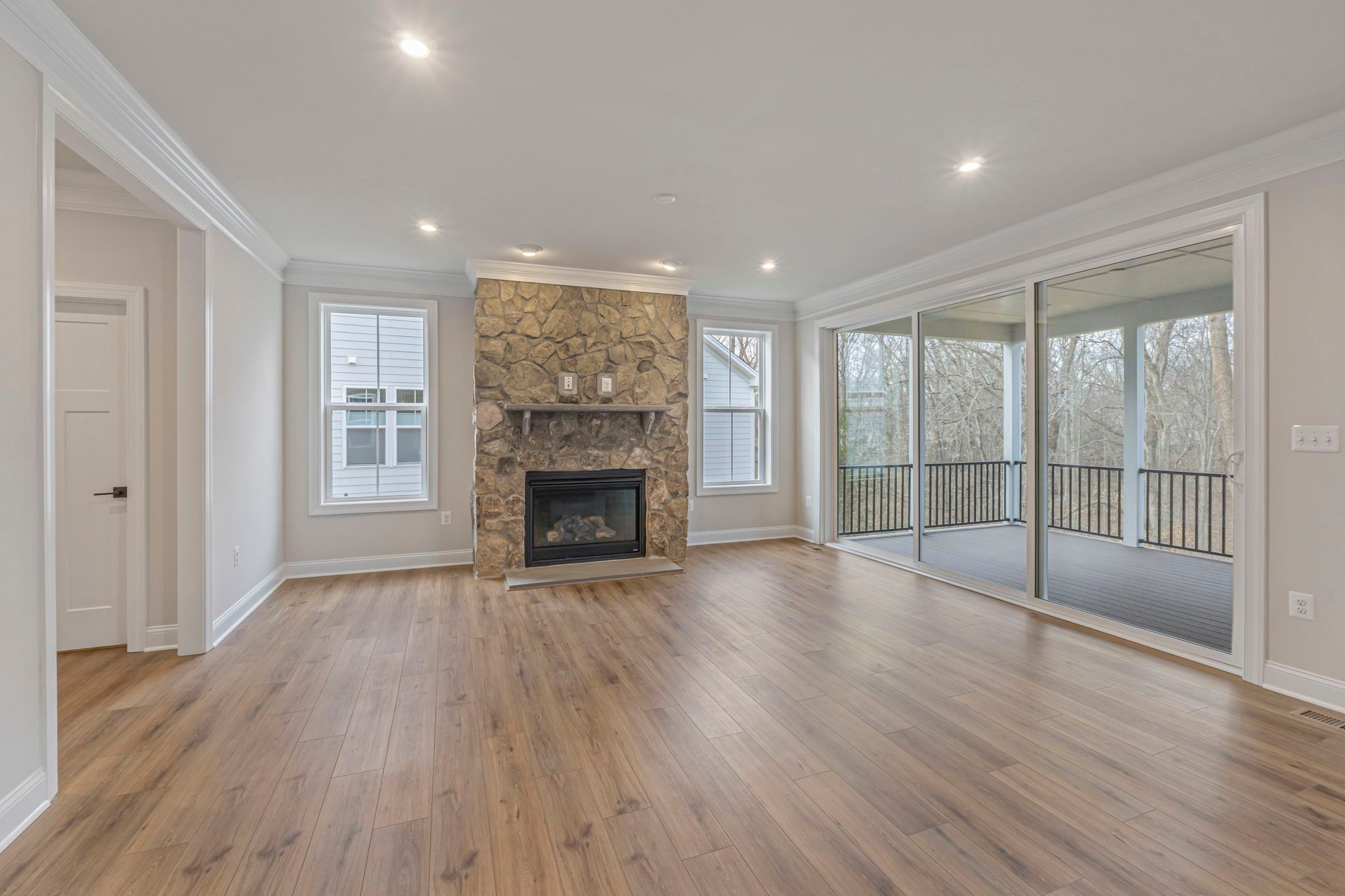 Family Room with Optional Stone Fireplace & Optional Sliding Doors