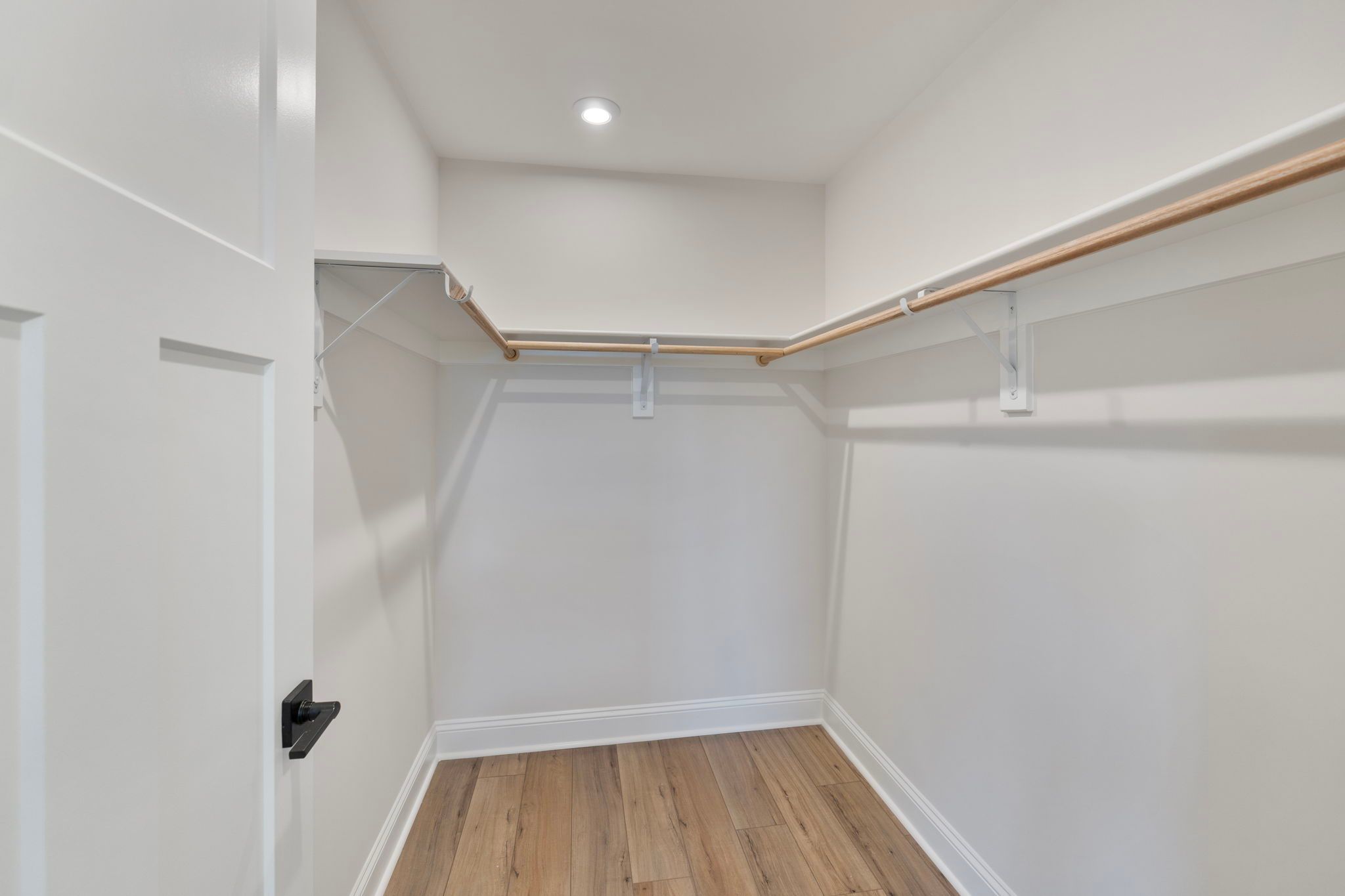 Primary walk-in closet - similar to photo