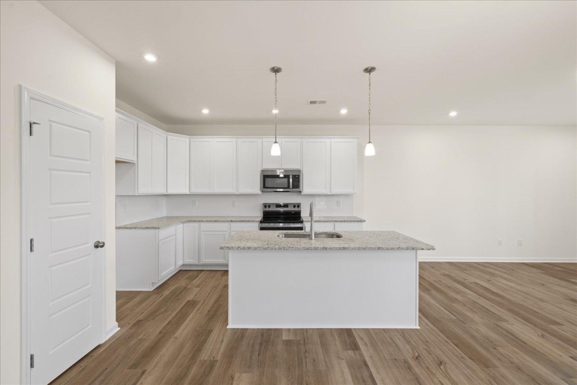 04-HHHunt Homes-Lot 18-Whitfield-Kitchen White Backsplash and Cabinets