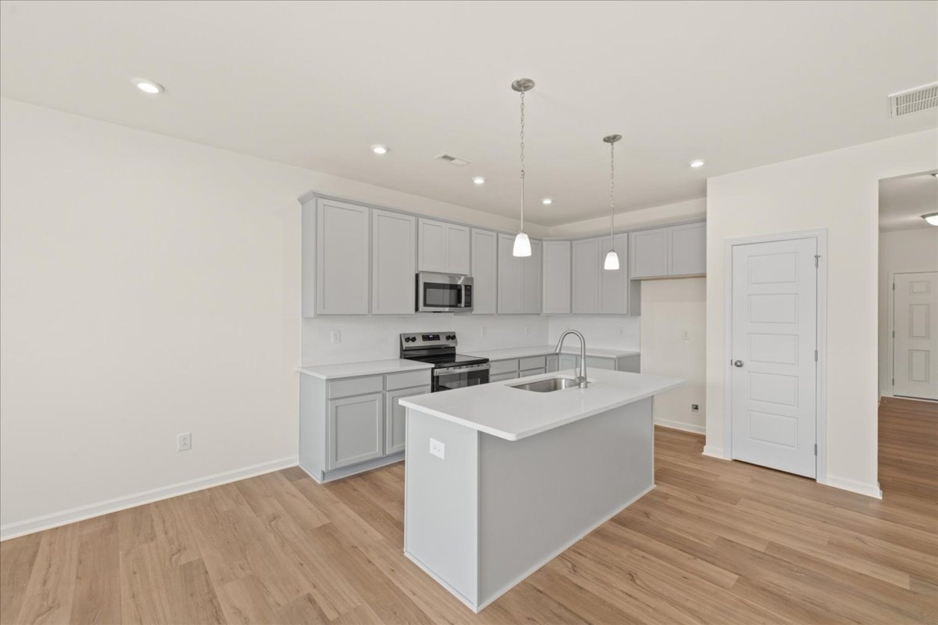 70-HHHunt Homes-Lot 23-Whitfield-Kitchen Gray Cabinets Side VIew