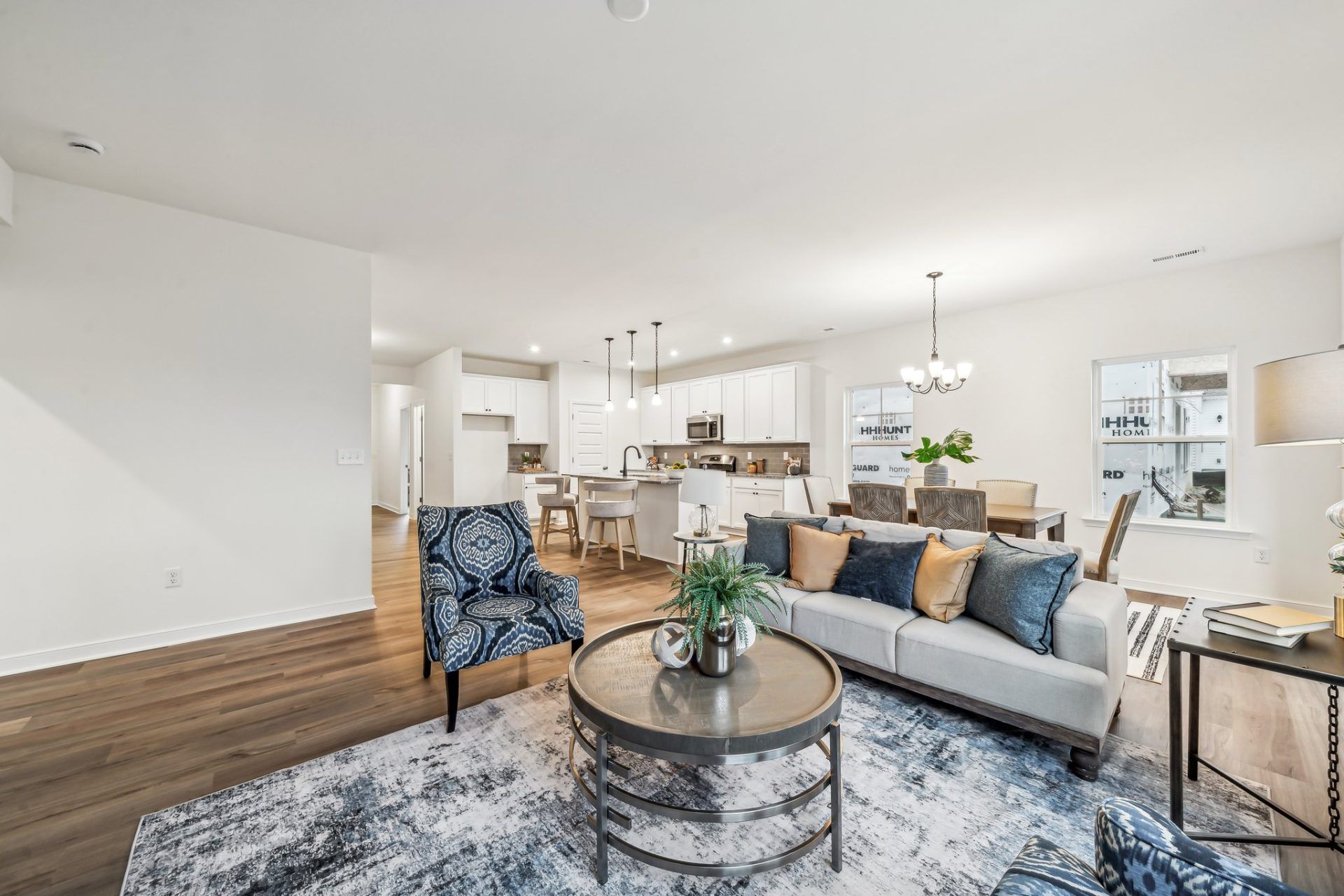 9- Maxwell HHHunt Homes Family Room Dining Room and Kitchen