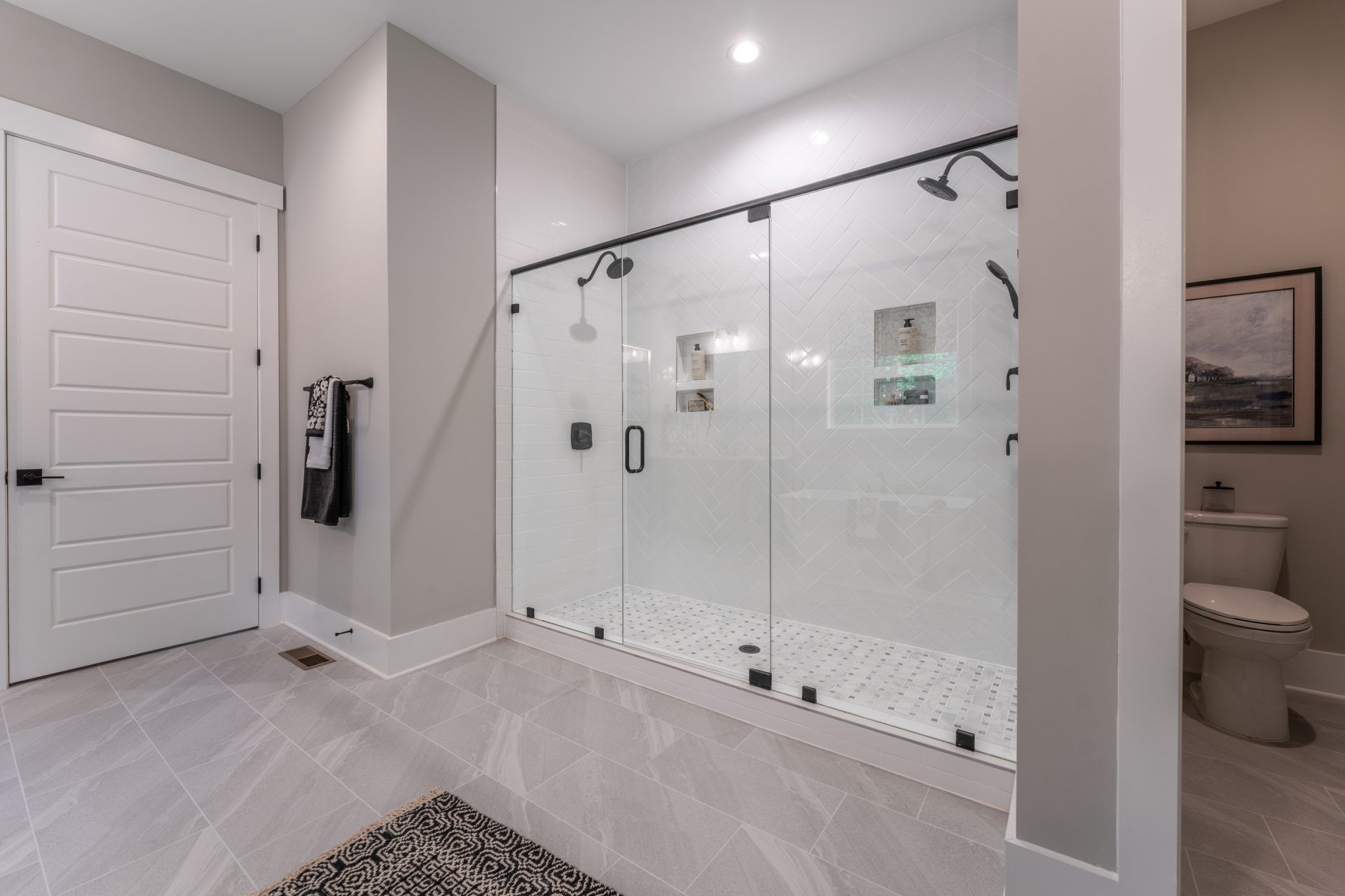 32. HHHunt Homes Crawford- First Floor Primary Bathroom 8 ' shower close up