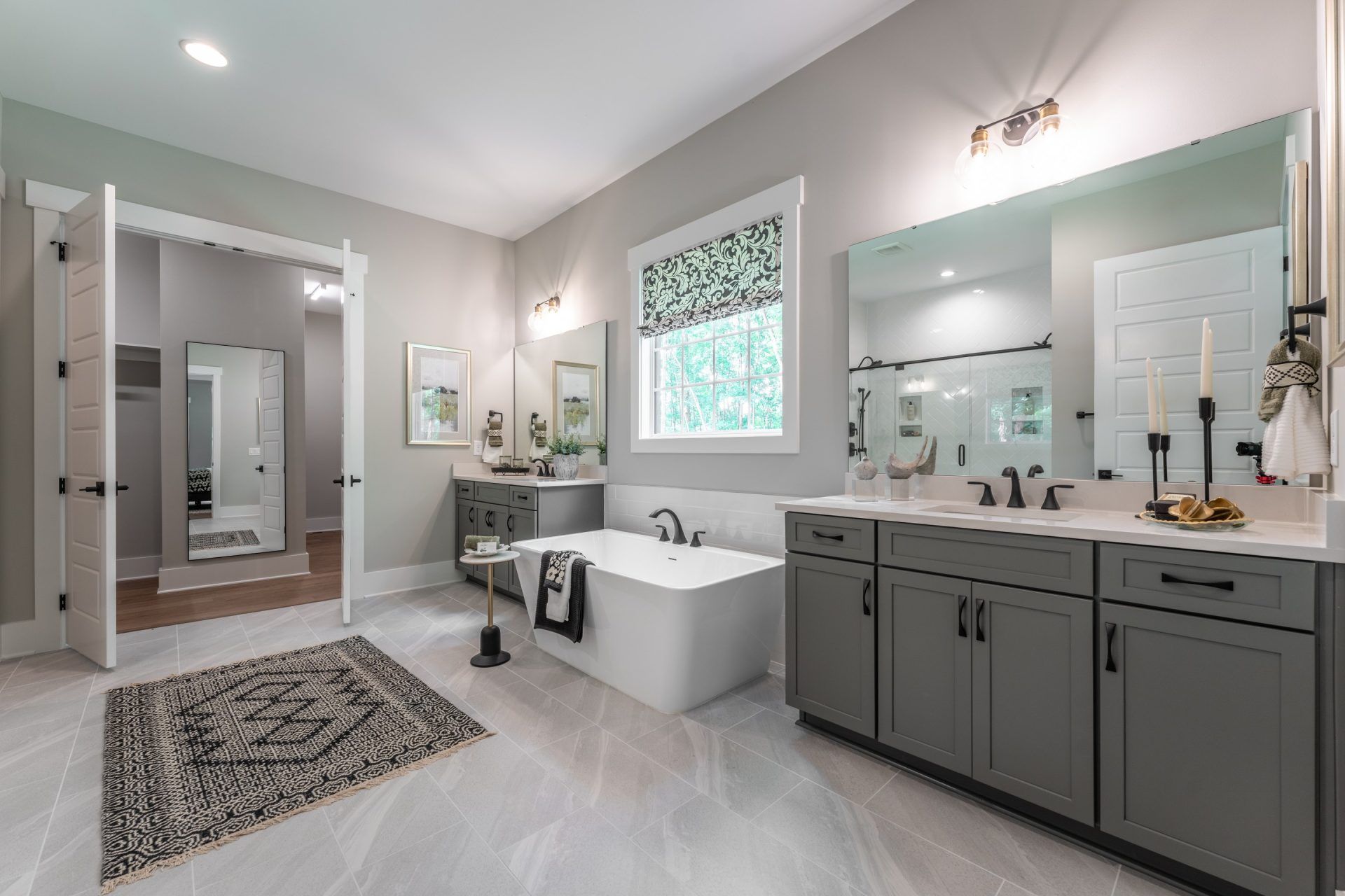 30. HHHunt Homes Crawford- First Floor Primary Bathroom With Soaking tub