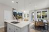 casa en Harmony Isle Townhomes por Hartizen Homes