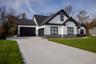 casa en woodhaven preserve por Helen Scott Custom Builders, Inc.