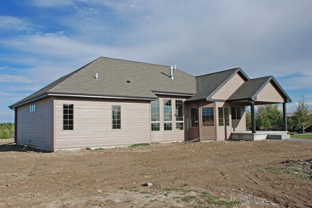 casa en Hill Builders, Inc por Hill Builders, Inc