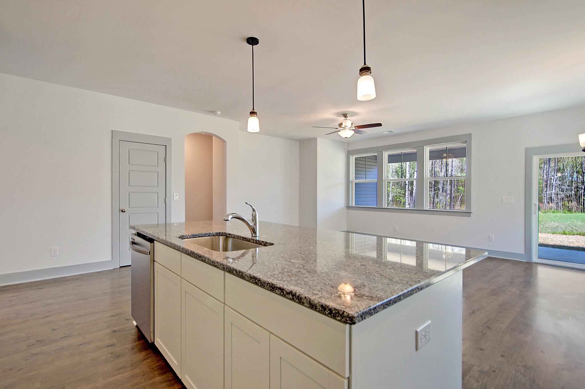 Freehold Kitchen Island Overlooking Living Room