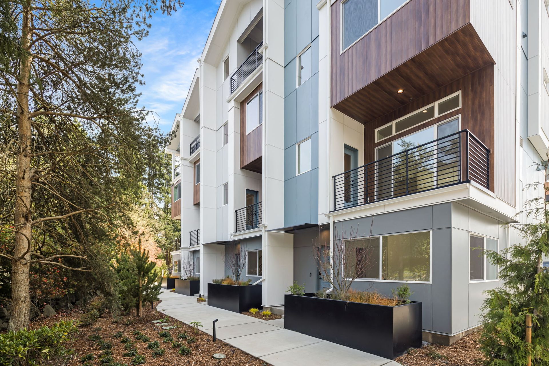 Front doors of the homes in Building1. The two end homes are Floor Plan C, and the two middle homes are Floor Plan A
