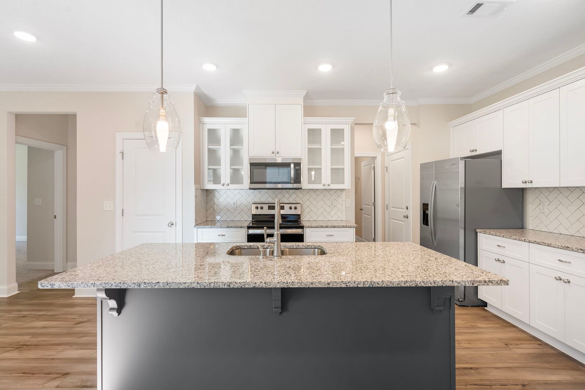 The 1313 Plan | Functional & Maximized Space designed by Ivey Homes