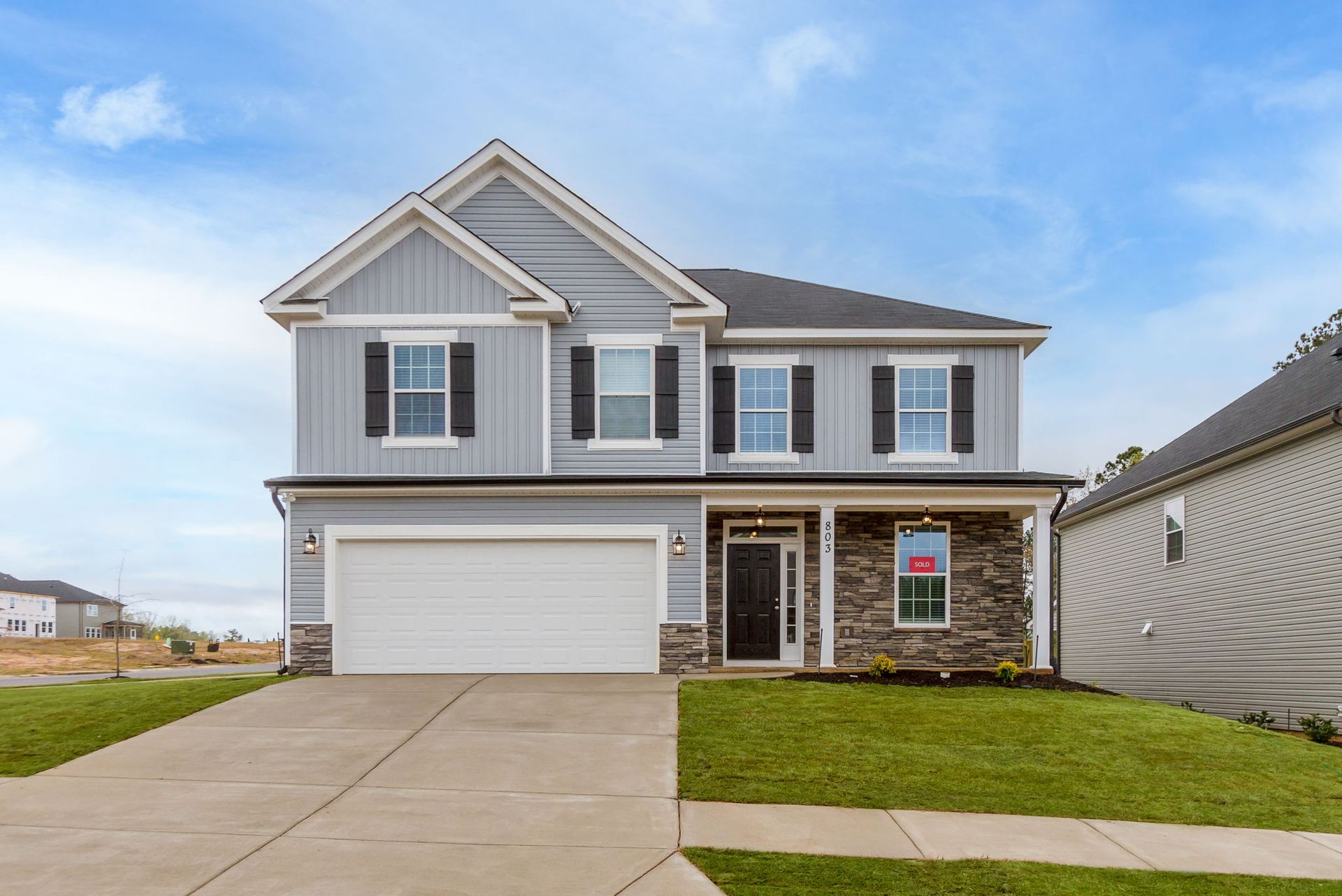 Front Exterior | New Construction Home in Windsor by Ivey Homes