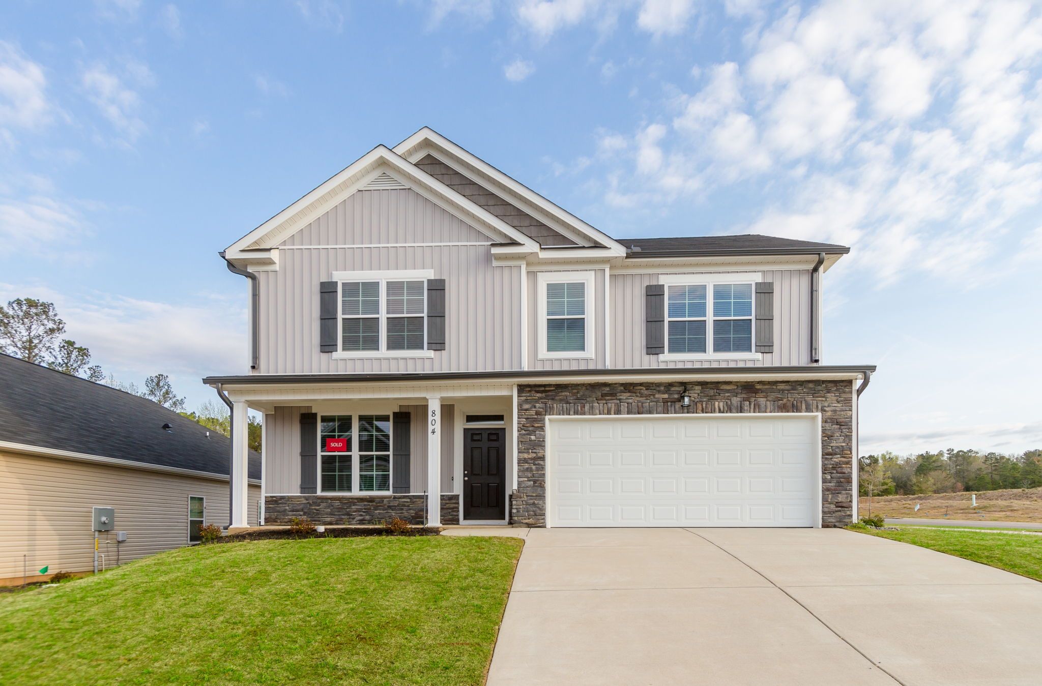 Front Exterior | New Construction Home in Windsor by Ivey Homes