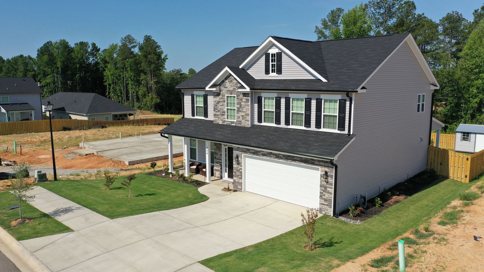 Front Exterior | New Construction Home in Windsor by Ivey Homes