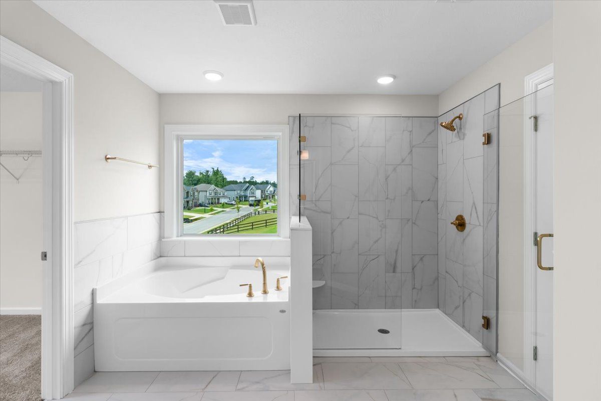 Primary Bathroom Tub and Shower | 250 Prominence Drive in Tillery Park