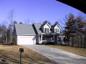 casa en Jim Hutchins Construction Company por Jim Hutchins Construction Company