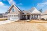 casa en Jim Mathews Builder por Jim Mathews Builder.