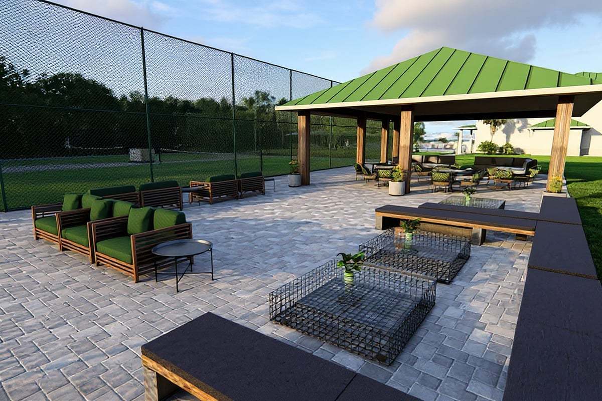 Planned community racquet sports patio and pavilion, and tennis and pickleball courts