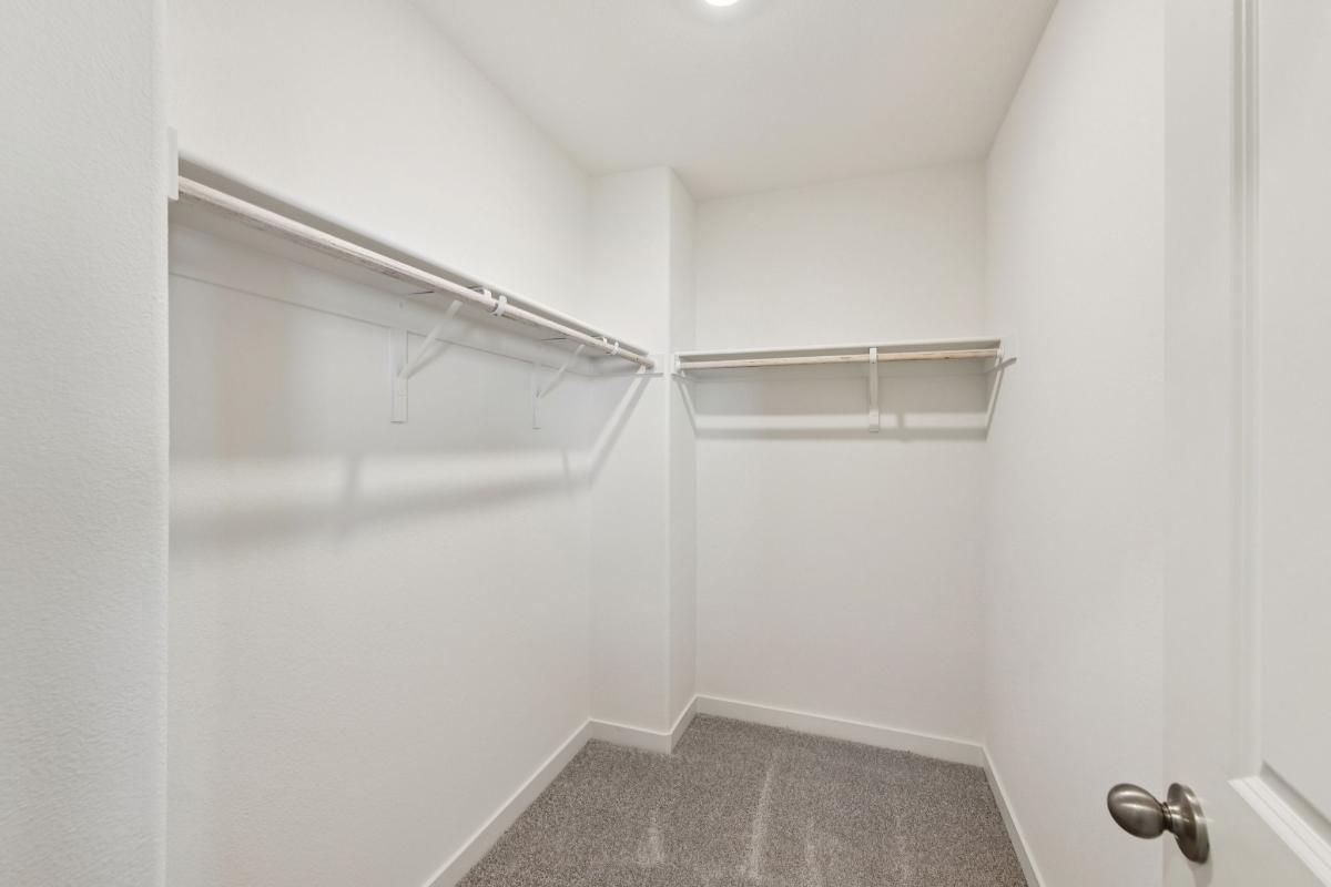 Primary walk-in closet
