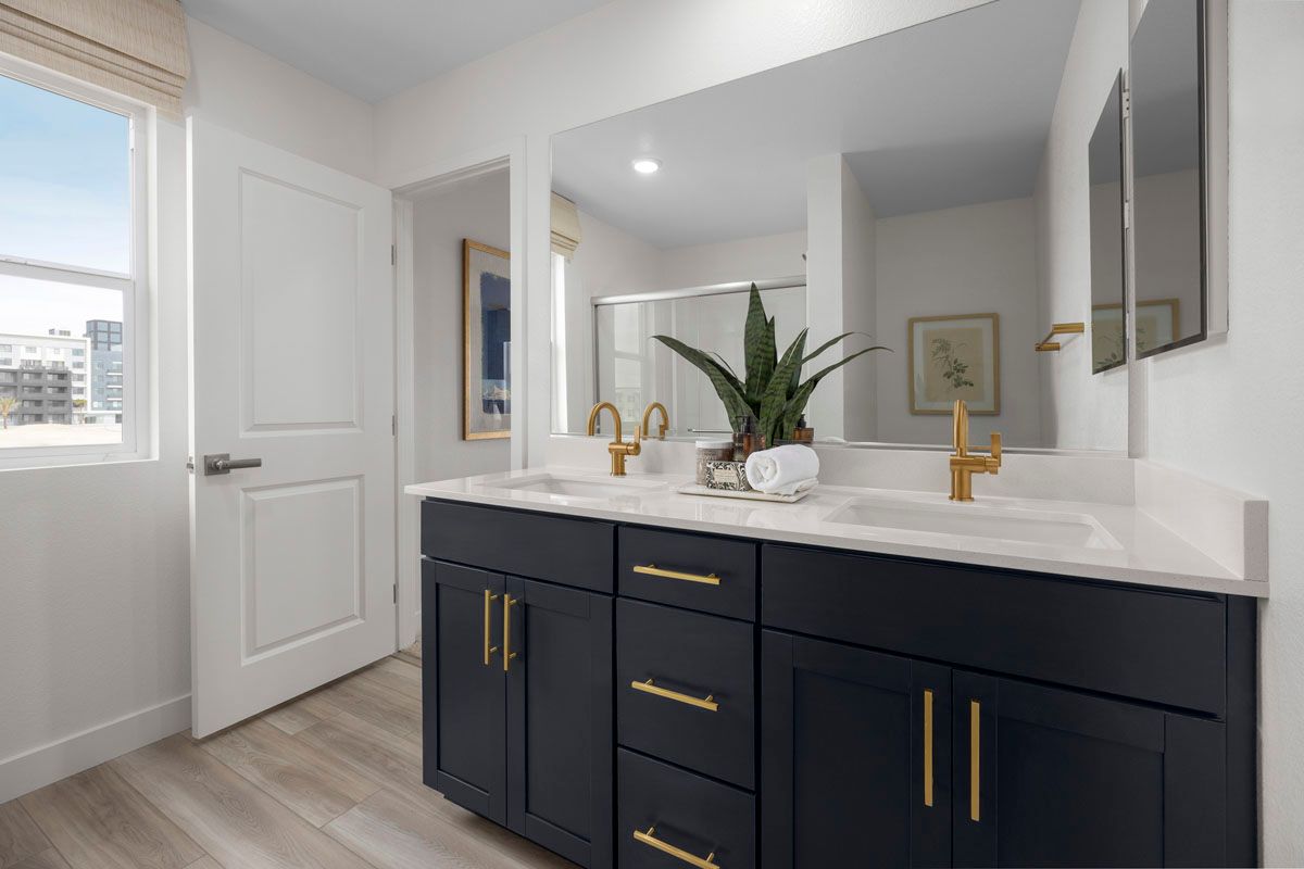 Plan 1201 End Unit Modeled - Dual-sink vanity at primary bath