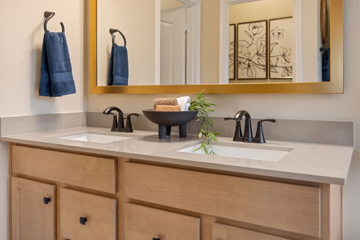 Plan 1675 Modeled - Dual-sink vanity at primary bath