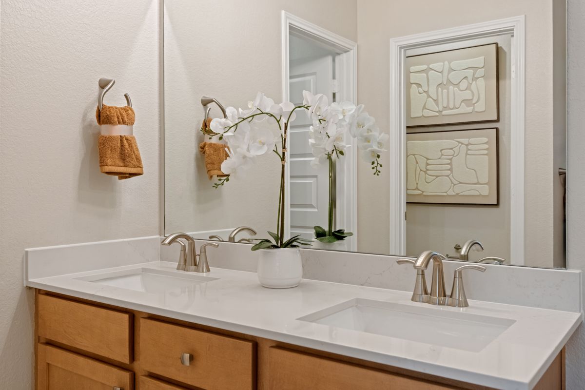 Plan 1675 Modeled - Dual-sink vanity at primary bath