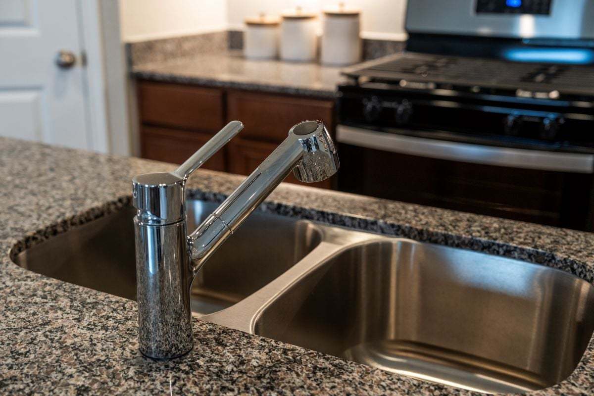 Dual-basin kitchen sink
