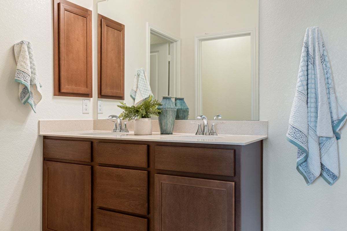 Plan 1675 Modeled - Dual-sink vanity at primary bath
