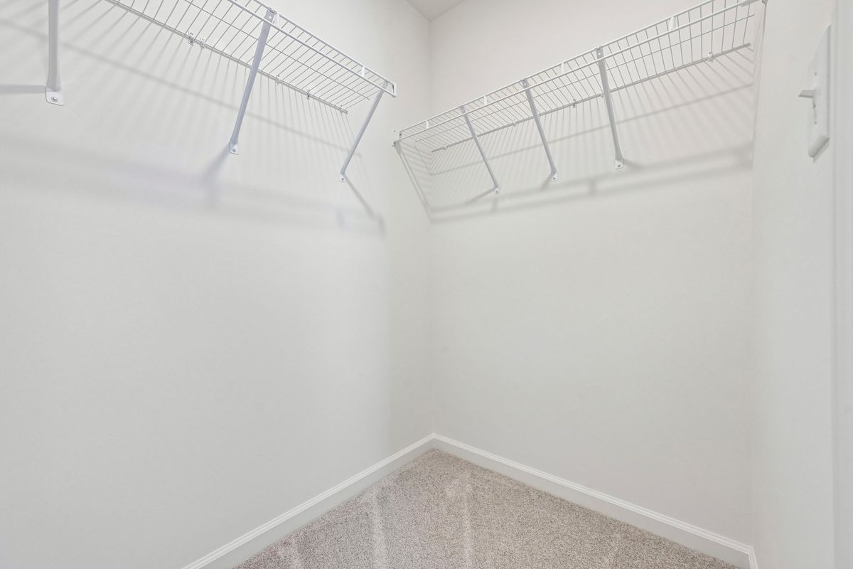 Primary walk-in closet