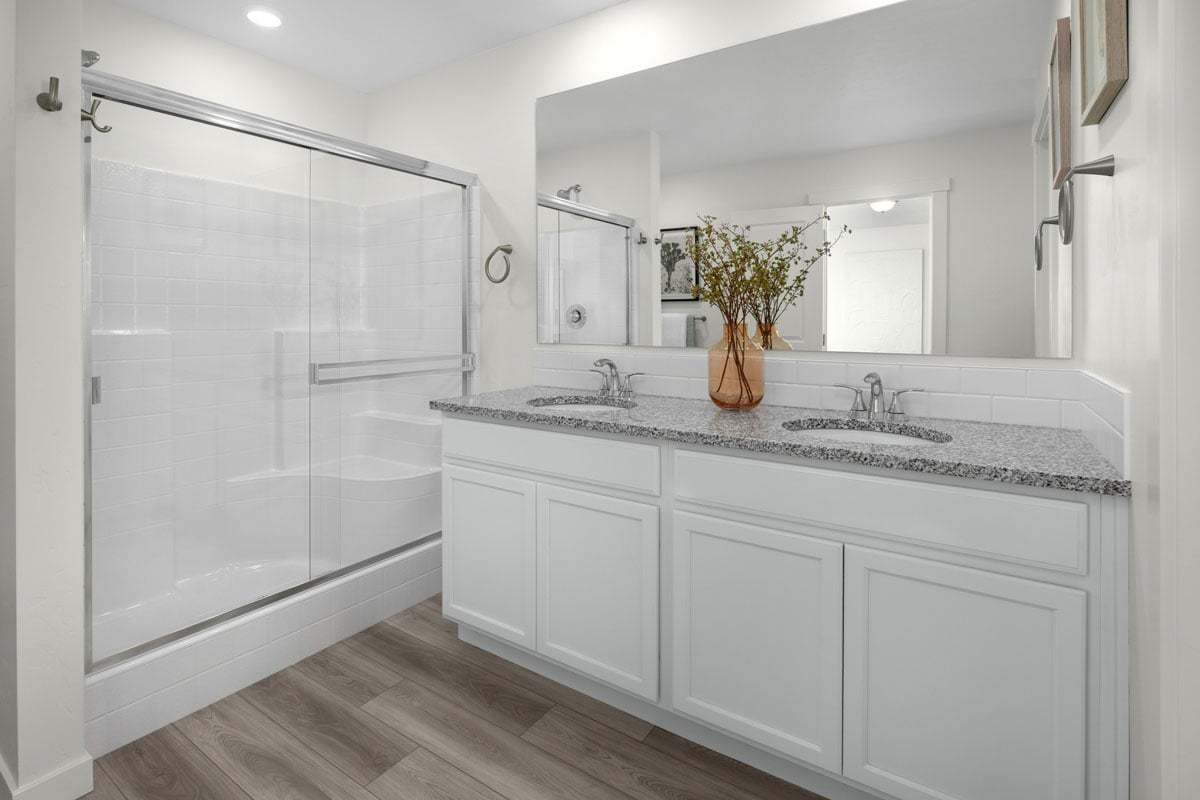 Plan 1570 Modeled - Dual-sink vanity at primary bath