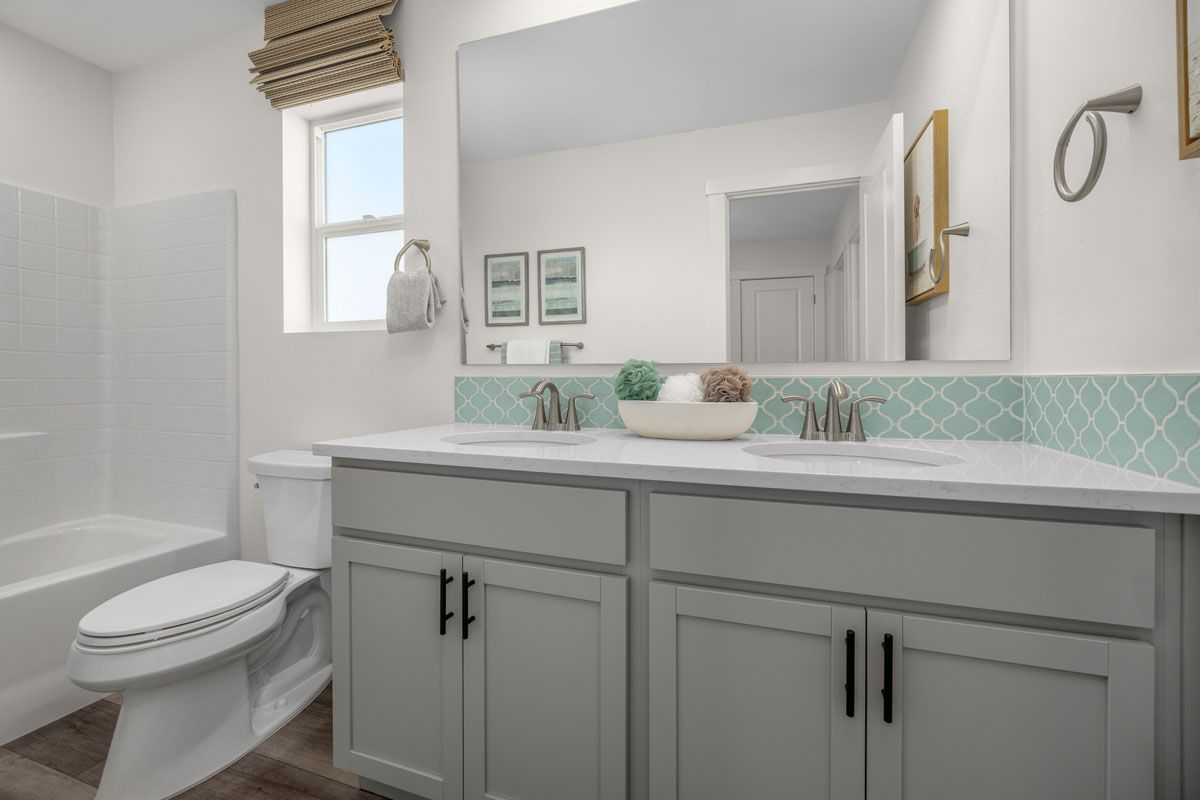 Plan 2330 Modeled - Dual-sink vanity at bath 2