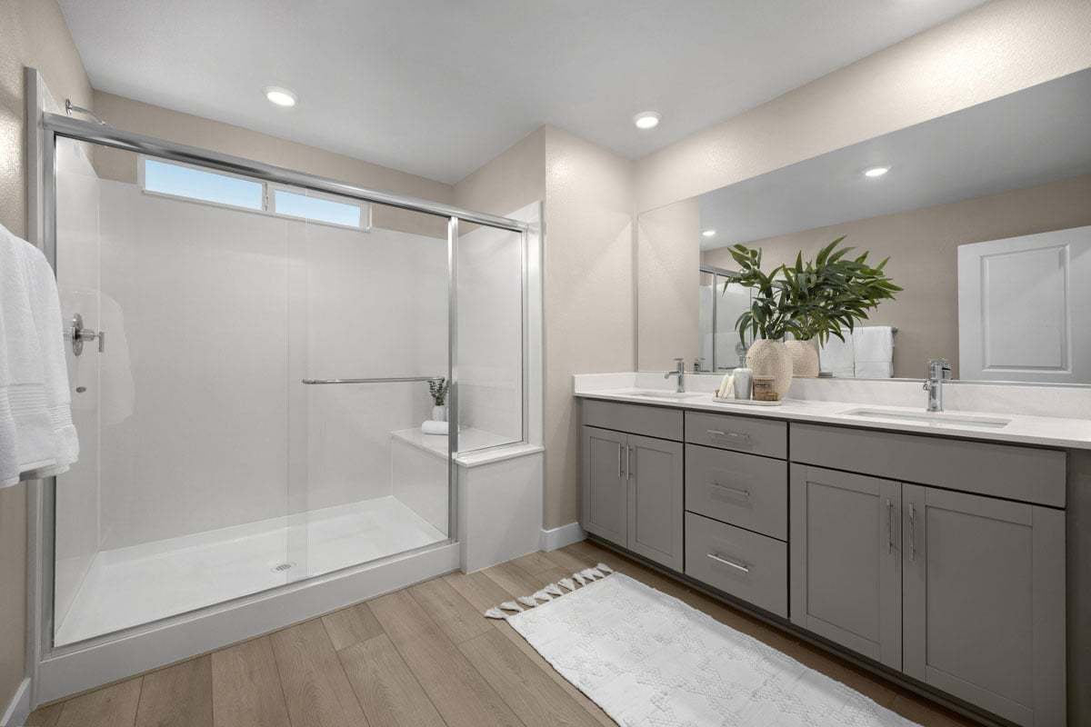 Plan 2469 Modeled - Walk-in shower with seat at primary bath
