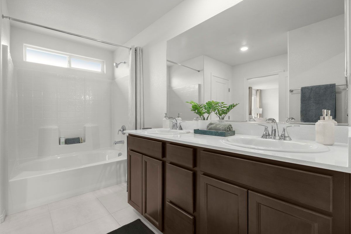 Plan 1590 Modeled - Dual-sink vanity at primary bath