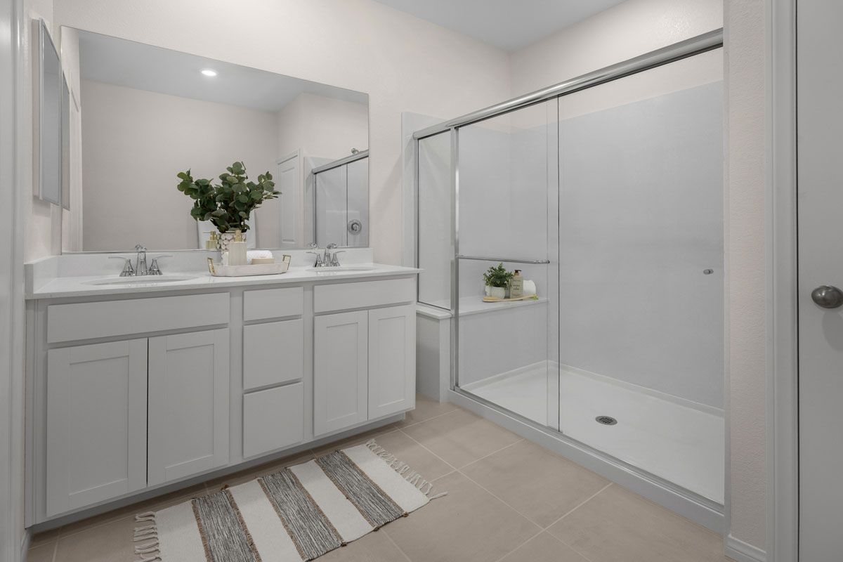 Plan 1687 Interior Unit Modeled - Large walk-in shower with seat at primary bath