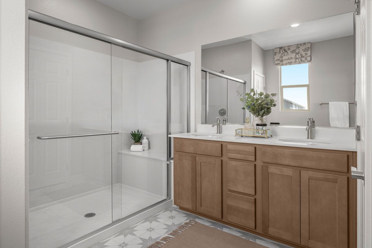 Plan 1809 End Unit Modeled - Walk-in shower with seat at primary bath