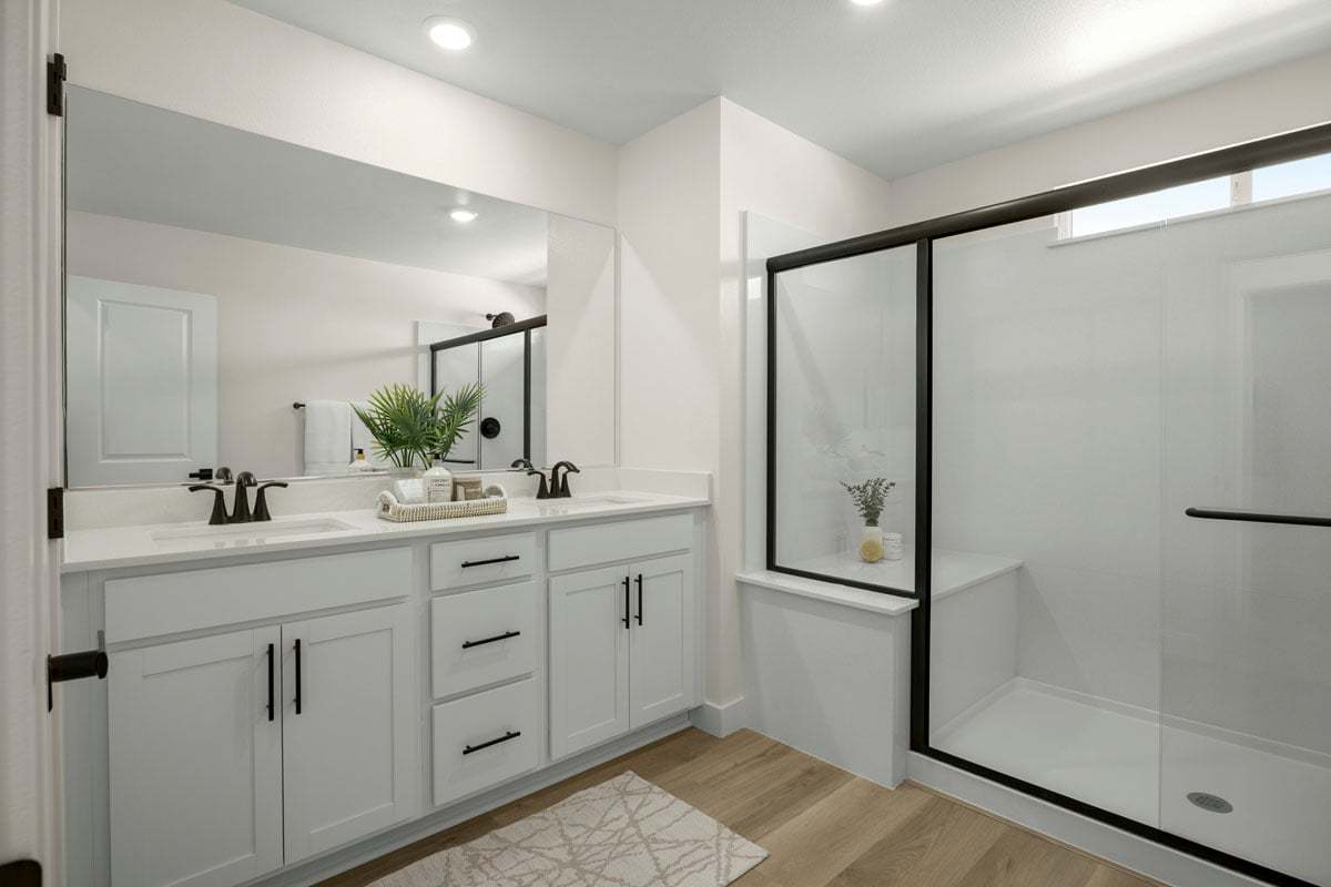 Plan 2469 Modeled - Walk-in shower with seat at primary bath