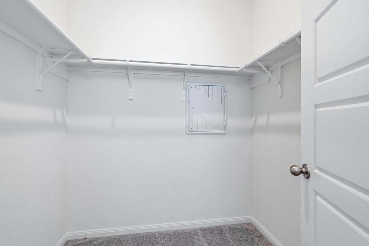 Primary walk-in closet