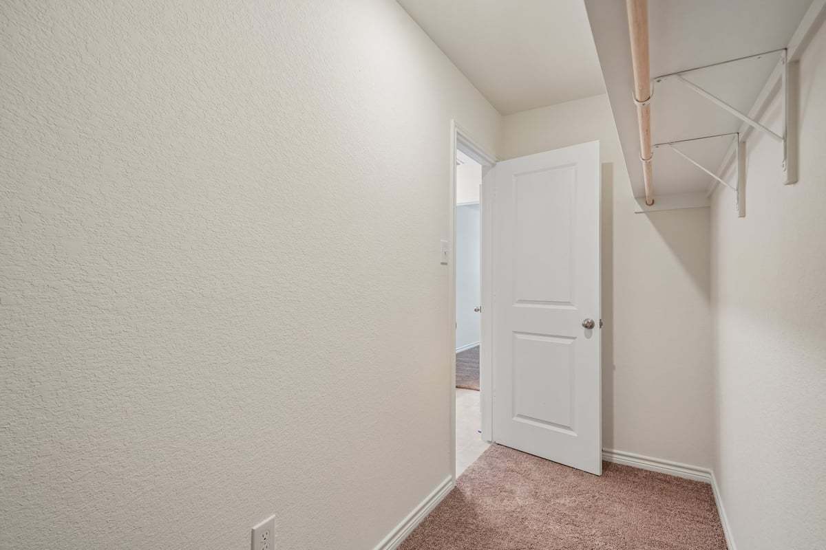 Primary walk-in closet