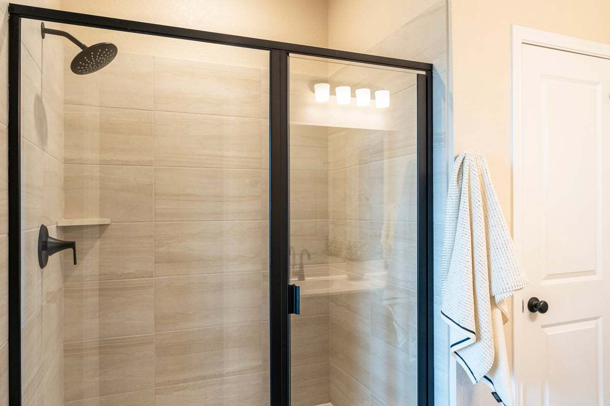 Optional walk-in shower with tile surround at primary bath