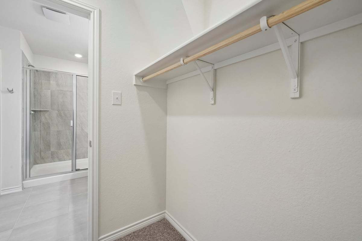Primary walk-in closet