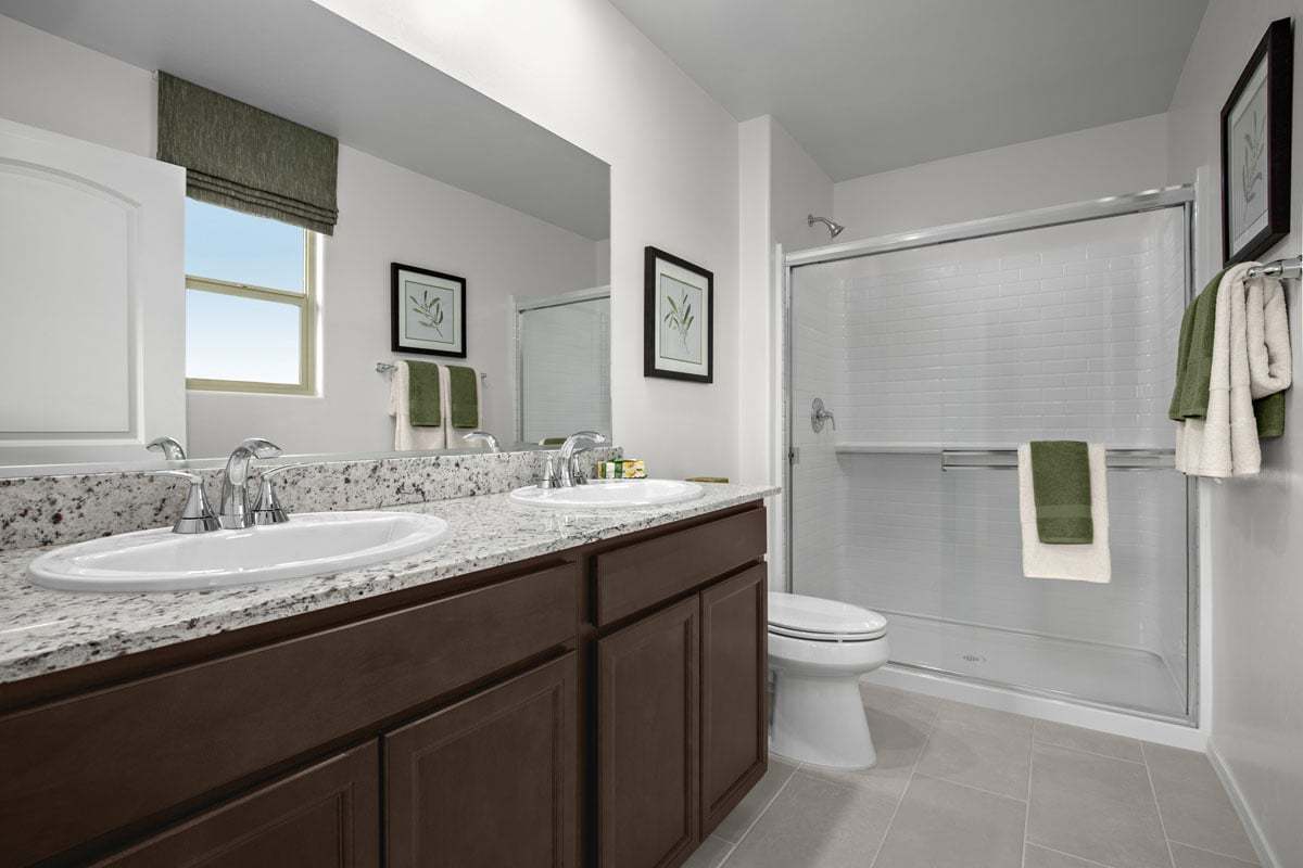 Plan 1465 Modeled - Upgraded Silestone® quartz countertop at primary bath