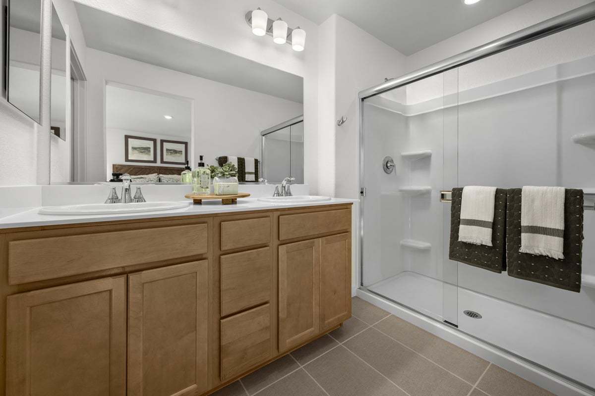 Plan 1565 Modeled - Dual-sink vanity at primary bath