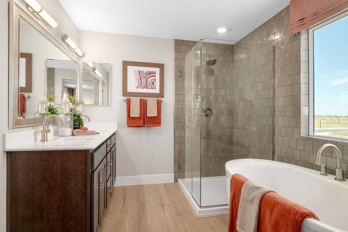 Plan 2693 Modeled - Tub and separate shower with custom tile surround at primary bath