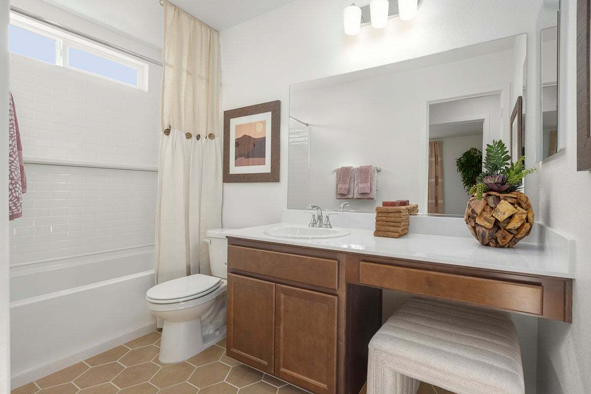 Plan 1587 Modeled - Extended vanity with knee space at bath 2