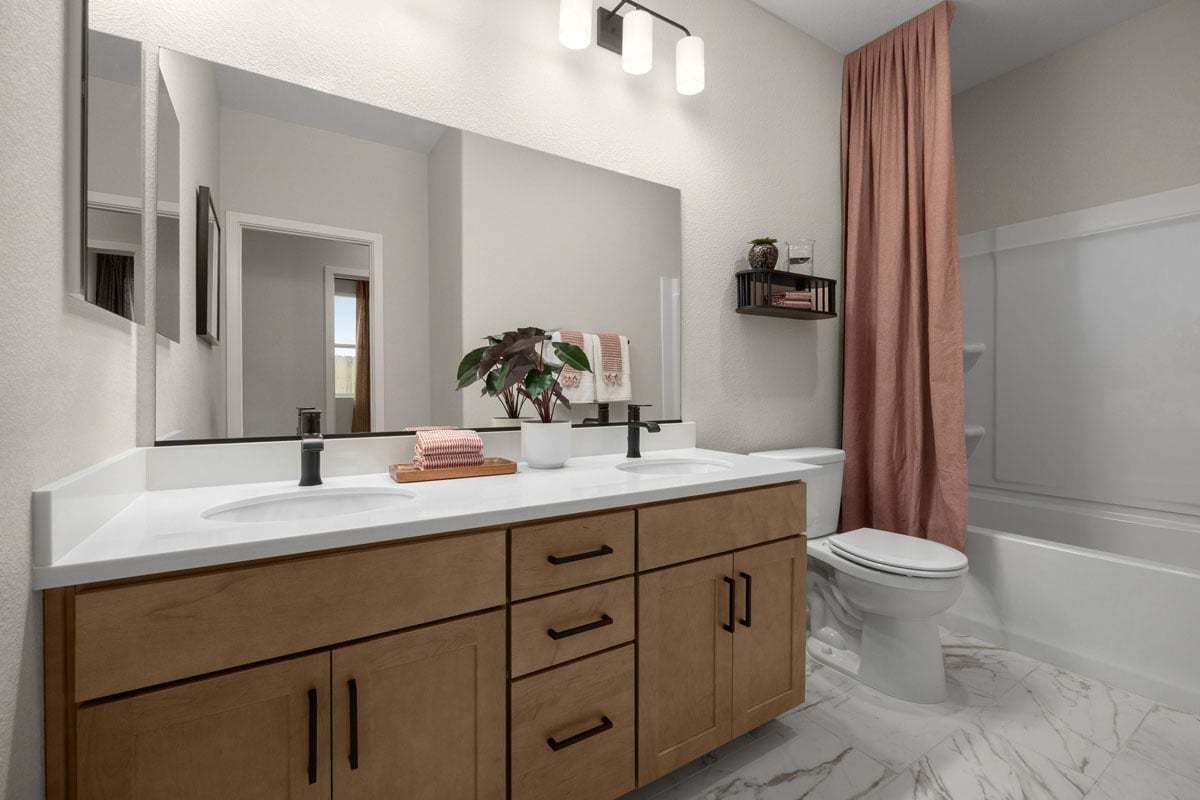 Plan 2829 Modeled - Dual-sink vanity in secondary bathroom
