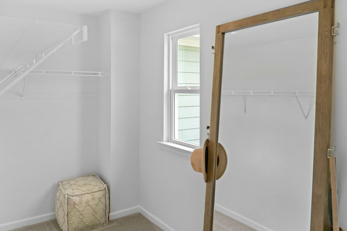 Plan 1702 Modeled - Walk-in closet at primary suite