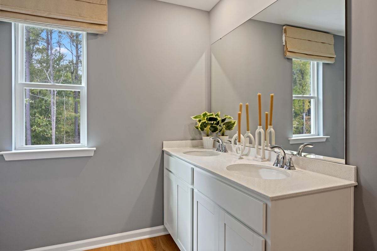 Plan 1566 Modeled - Dual-sink vanity at primary bath