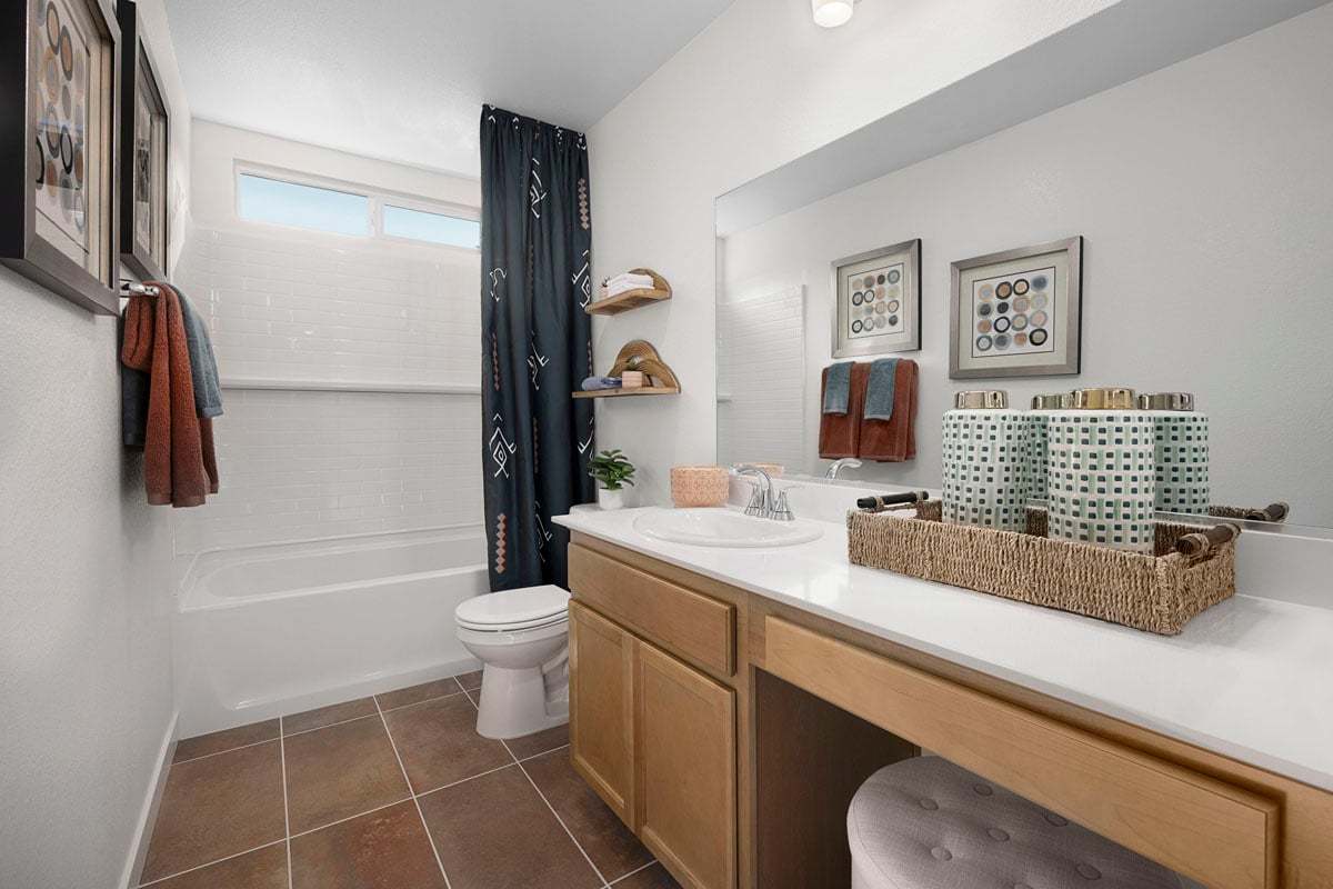 Plan 1404 Modeled - Extended vanity with knee space at bath 2