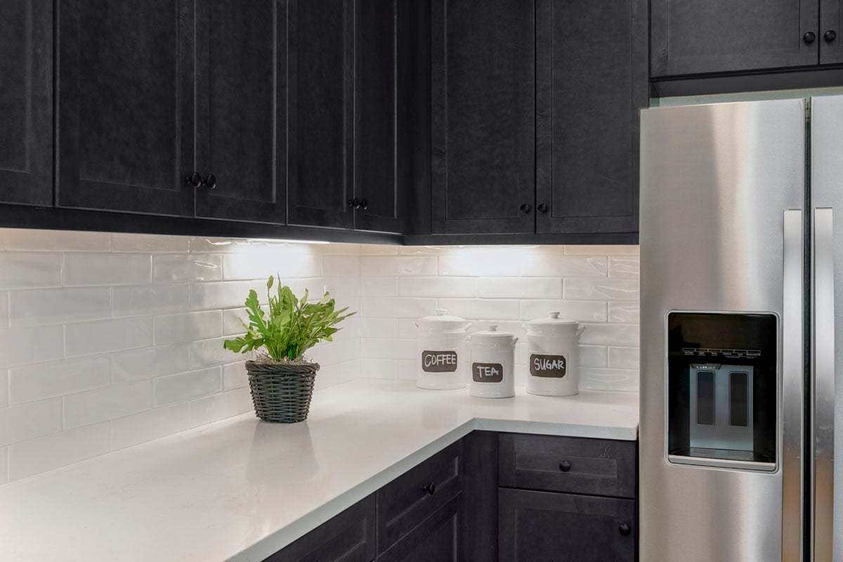 Plan 2218 - Upgraded quartz countertops with full tile backsplash